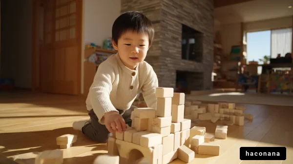 積み木で遊ぶ子供