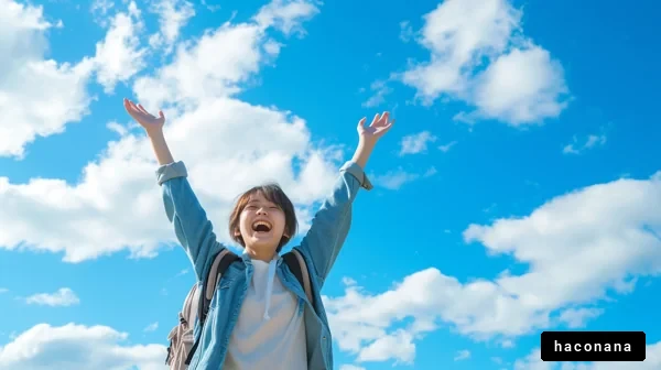 青空の下で喜ぶ女性