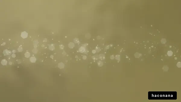 金色の背景に光る粒子